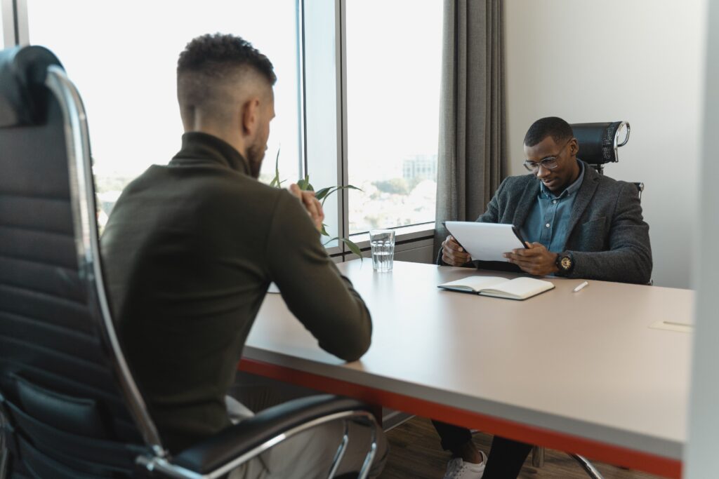Business professional speaking with a customer and gathering valuable feedback to identify growth opportunities
